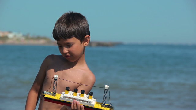 Boy made a model of the Titanic. Titanic sinking
