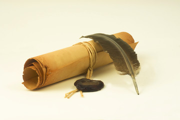 Old scroll paper with a stamp and pen