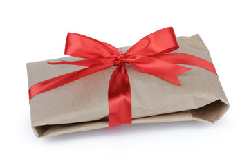 gift pacel packet tied with red ribbon, isolated on white