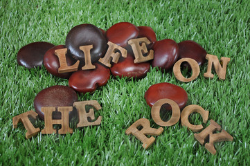 Phase of Life on the rock in wooden design, motivation concept