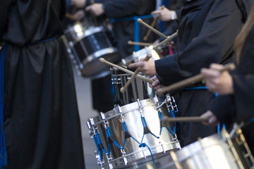 people drumming during Holy Week in Teruel, Spain