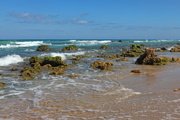 Fototapeta na wymiar Huge stones and sea. Coast Mediterranean sea,Netanya, Israel