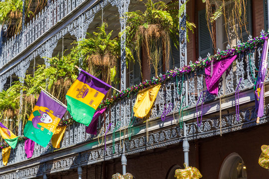 Ironwork galleries on the Streets of French Quarter decorated for Mardi Gras in New Orleans,  Louisiana