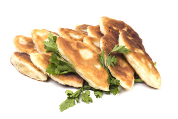 many fried cakes with herbs
