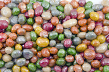Multicolored glazed raisins background