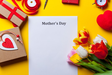 tulips and paper with words Mothers day