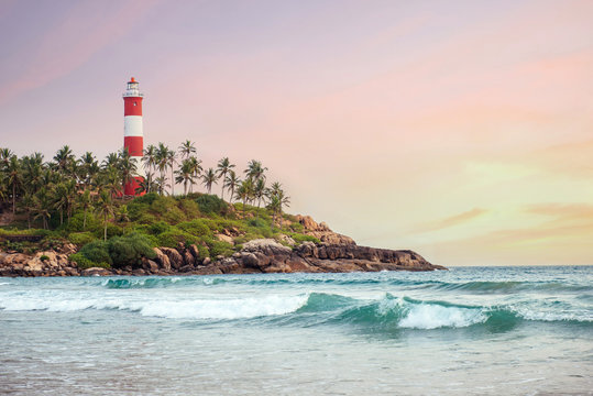 Fototapeta Lighthouse on the cliff in Kovalam Beach