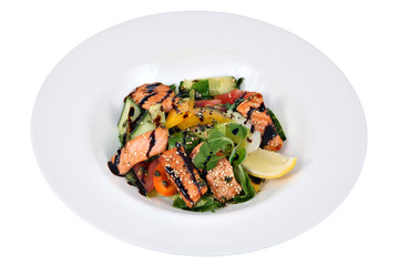 Fried salmon salad  in round white plate Isolated studio shot.
