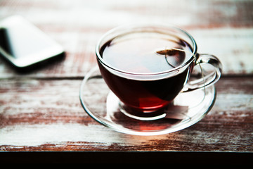 red tea with a tablet on a table in an office