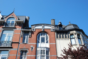 Old roofs, windows and architecture details in old buildings in Liege, Belgium. 