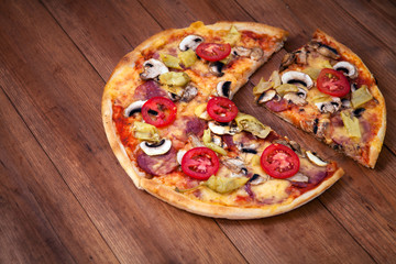 pizza on wood background