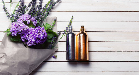 wildflowers with perfume bottles