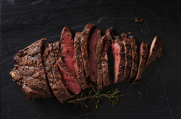 grilled flat iron steak shot in flat lay style from overhead - obrazy, fototapety, plakaty