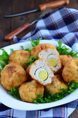 Scotch eggs and salad