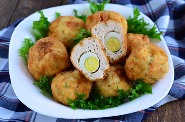 Scotch eggs and salad