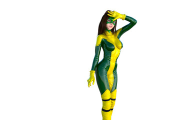 one young girl in a yellow-green latex posing on colored background