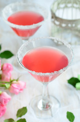 Cosmopolitan cocktail on white background