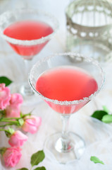 Cosmopolitan cocktail on white background