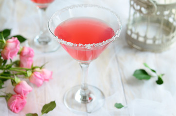 Cosmopolitan cocktail on white background