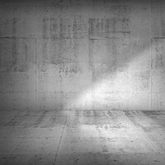 Concrete wall and floor with strong side illumination