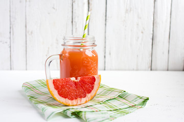 Grapefruit juice in a jar