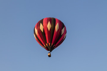 Colorful hot air balloon in the blue sky, festival