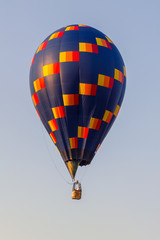 Colorful hot air balloon in the blue sky, festival