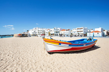 Fisher boat at the beach in Armacao de Pera in Portugal