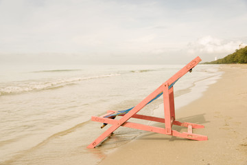 Fototapeta premium Pink beach chair