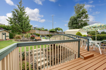 Large deck with nature patterned table set.