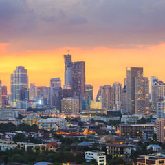 Fototapeta premium Aerial view of Bangkok modern office buildings, condominium in Bangkok city downtown with sunset sky , Bangkok , Thailand