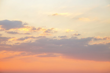 Fototapeta na wymiar beautiful sunset or sunrise with orange colored clouds background 