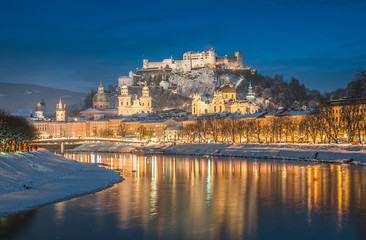 Naklejka na ściany i meble Historic city of Salzburg in winter at dusk, Austria