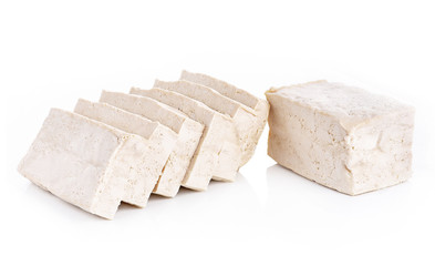 Tofu cubes isolated on white background