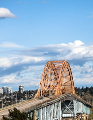 
Pattullo Bridge at sunny day and cloudy sky