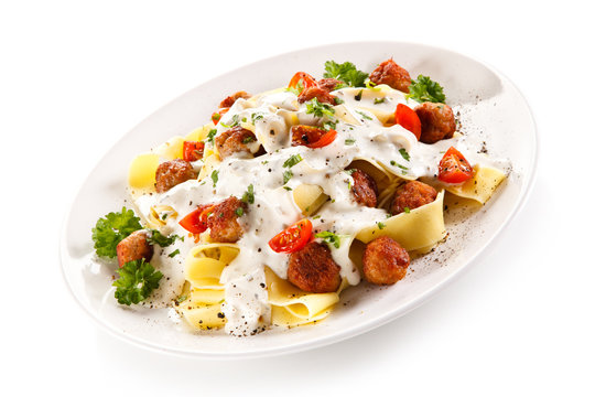 Pasta with meatballs and cream sauce