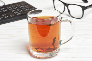 Cup of tea and tea-strainer