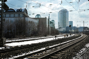 Munich skyline. Urban industrial landscape with railways of S-Bahn train in Munich, Bavaria, Germany.