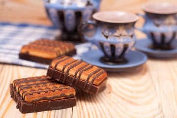zephyr cookie with tea on wooden background