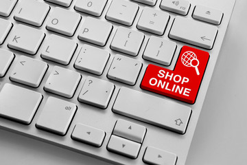 Keyboard with red online shopping theme buttons