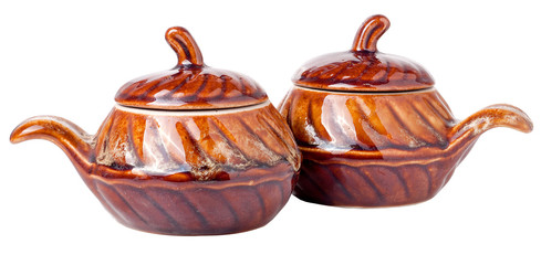 Glossy ceramic pots for cooking isolated on white background