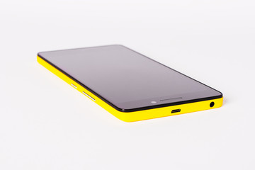 Yellow smartphone on a white background.