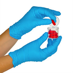 Naklejka premium hands with bottle of pills
