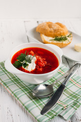 Ukrainian and Russian national red soup borsch with sour cream