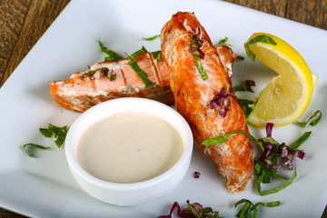 Baked salmon with sauce