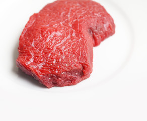 Raw beef fillet steak isolated on white background
