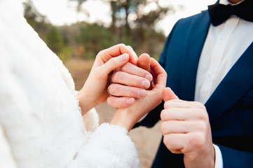 Fototapeta premium Happy love couple holding hands in the morning