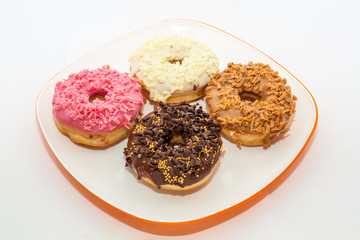 Fototapeta na wymiar Fancy Donuts with sugar coating