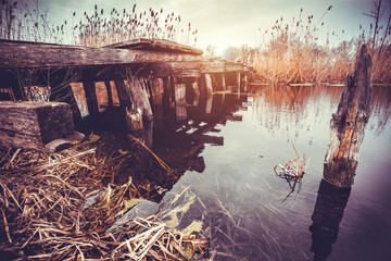 old wooden bridge over the river