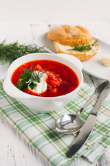 Ukrainian and Russian national red soup borsch with sour cream